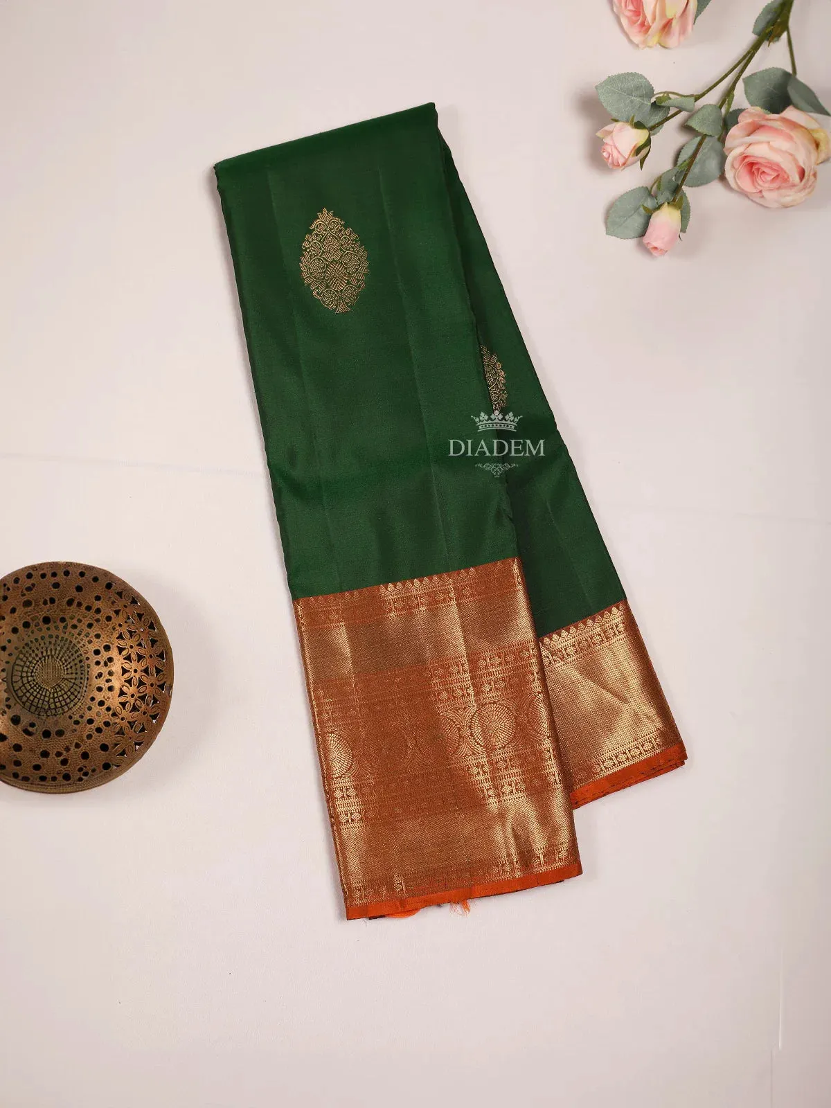 Dark Green Pure Kanchipuram (Bridal) Silk Saree with Floral Motif on the body and Contrast Zari Border