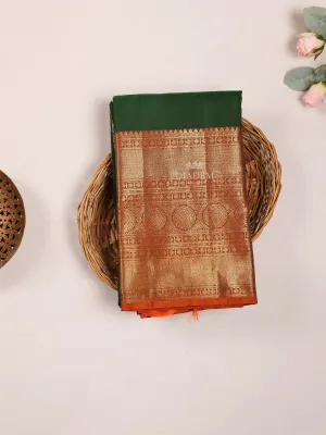 Dark Green Pure Kanchipuram (Bridal) Silk Saree with Floral Motif on the body and Contrast Zari Border